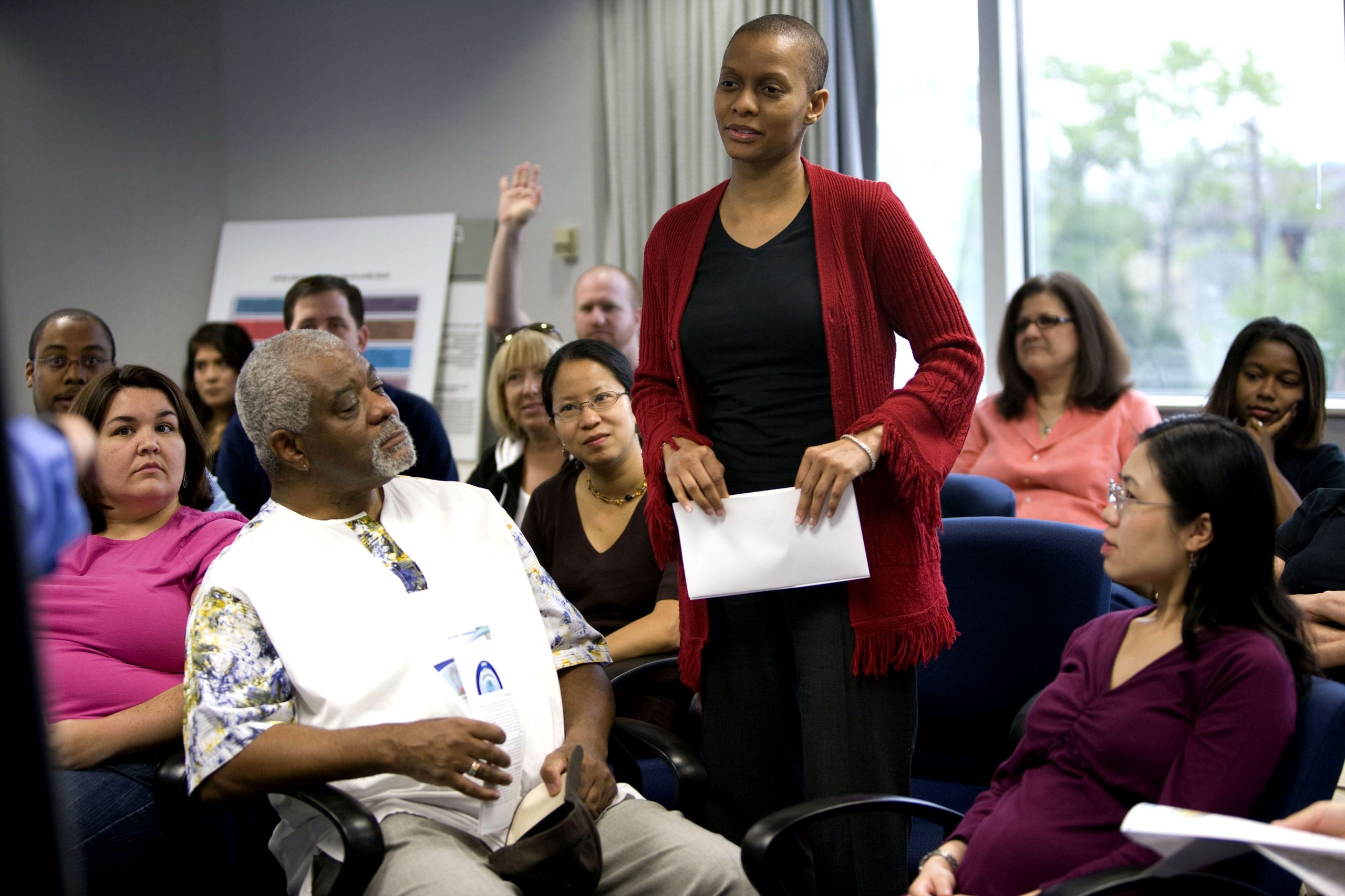 Nonprofit leader presenting to her community team